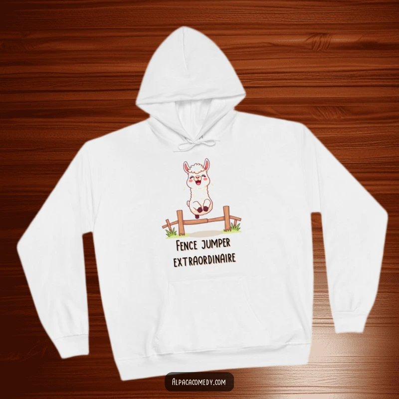 Funny hoodie showing an excited alpaca character leaping over a fence with a cheerful bleat, embodying enthusiasm and warmth.