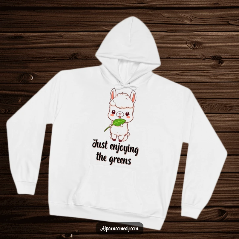 Funny Alpaca Hoodie: A happy alpaca with a funny, satisfied look, peacefully munching on a fresh green leaf.