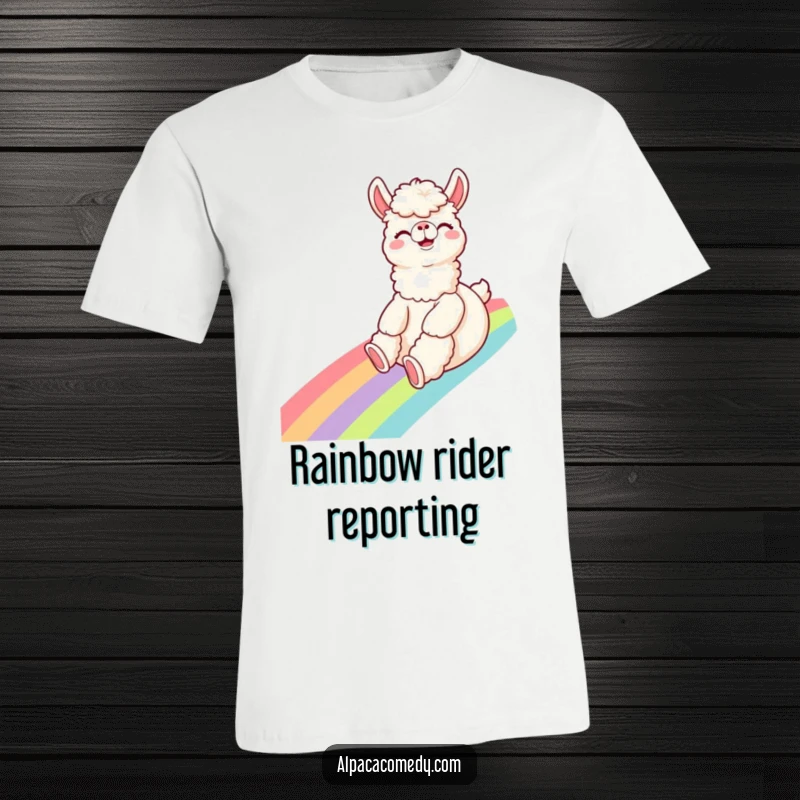 Funny Alpaca T-Shirt: A giggling alpaca slides down a rainbow with a wide, excited expression, radiating pure fun and happiness.